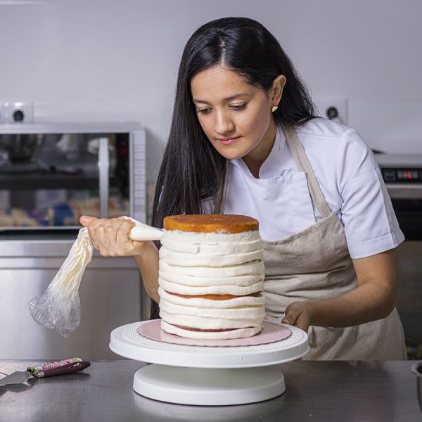 colombian-pastry-chef-using-a-pastry-bag-2025-03-10-12-47-42-utc